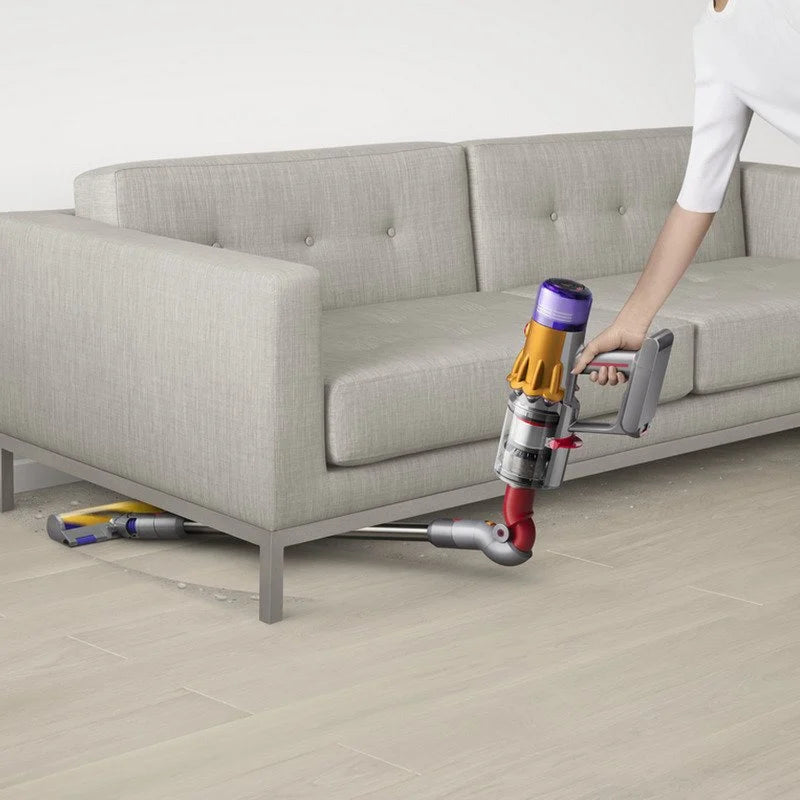 Dyson V12 Detect Slim Absolute cordless stick vacuum with sleek design and advanced cleaning features displayed.