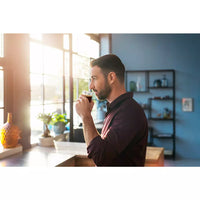 Philips EP2220/10 superautomatic coffee maker with integrated grinder, classic milk frother, and AquaClean filter in black.