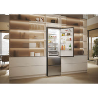 Haier Combi 3D 60 Series 5 refrigerator in inox finish, 205 cm tall, featuring No Frost and Direct Access design.