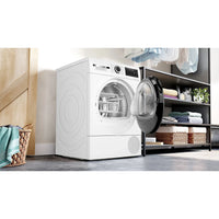 Bosch WQG245D0ES heat pump dryer, 9 kg capacity, white, featuring AutoDry and self-cleaning condenser.