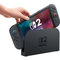 Nintendo Switch 2 console in blue and neon red with 7.9" Full HD display and magnetic Joy-Con controllers.