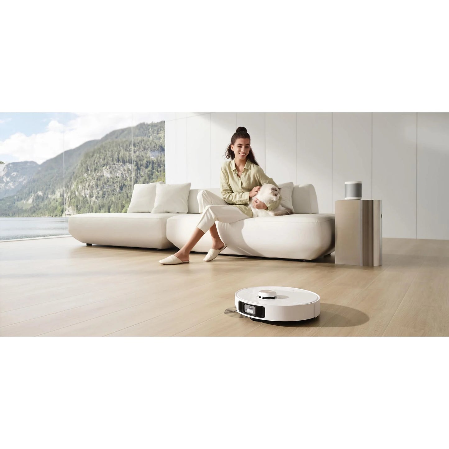 Dreame L40 Ultra robot friegasuelos in white with RGB lights, 700W power, and 5200 mAh battery on a clean floor.