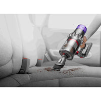 Dyson V15 Origin cordless vacuum with laser brush, showcasing its sleek design and advanced suction power.