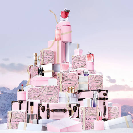 Calendario de Adviento LANCÔME 2025, edición exclusiva con diseño de maleta y 24 sorpresas, incluyendo 6 a tamaño completo.