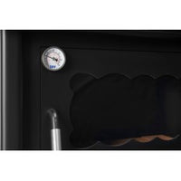 Estufa de leña Etna con horno superior y puertas de cristal vitrocerámico, mostrando diseño elegante y funcional.