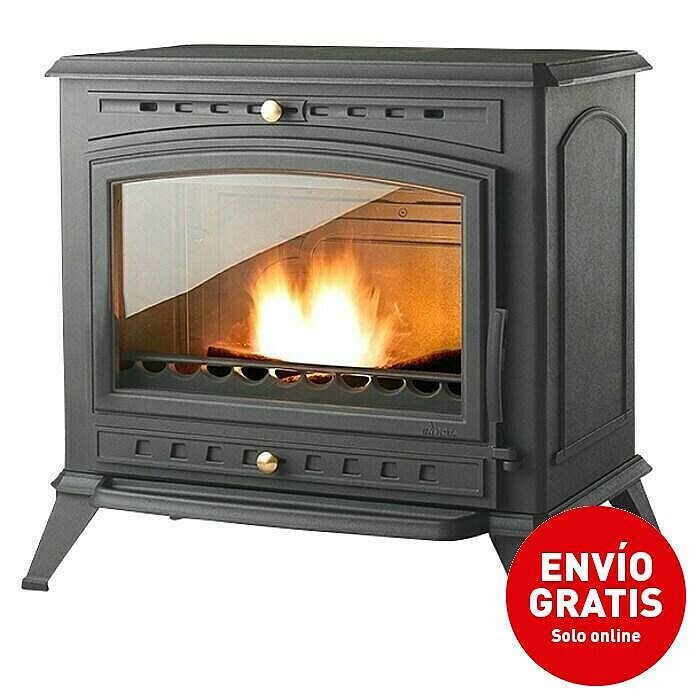 Estufa de leña Invicta Alma de 12 kW con diseño EcoDesign y sistema de post-combustión en un entorno acogedor.